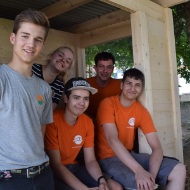 Lachende Gruppe von Lernendem