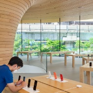 Product presentation in the Apple Store Bangkok under tree canopy