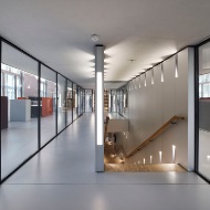 View of the bright hallway with stairs