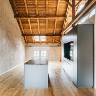 Interior of the Kornhaus with kitchen and stairs