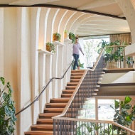 View of the wooden stairs inside Maggie’s Centre