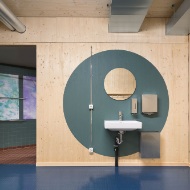 WC/shower/changing room area made of wood of the temporary gymnasium <br/>