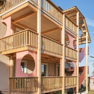 Apartment building with new timber arcades 