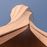 Close-up of the Urbach Tower from below looking towards the sky. The specially formed, gyrating wooden structure is clearly visible