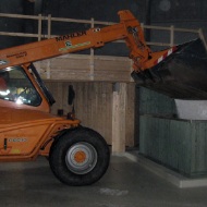 A swivel loader feeds a module conveyor system with salt