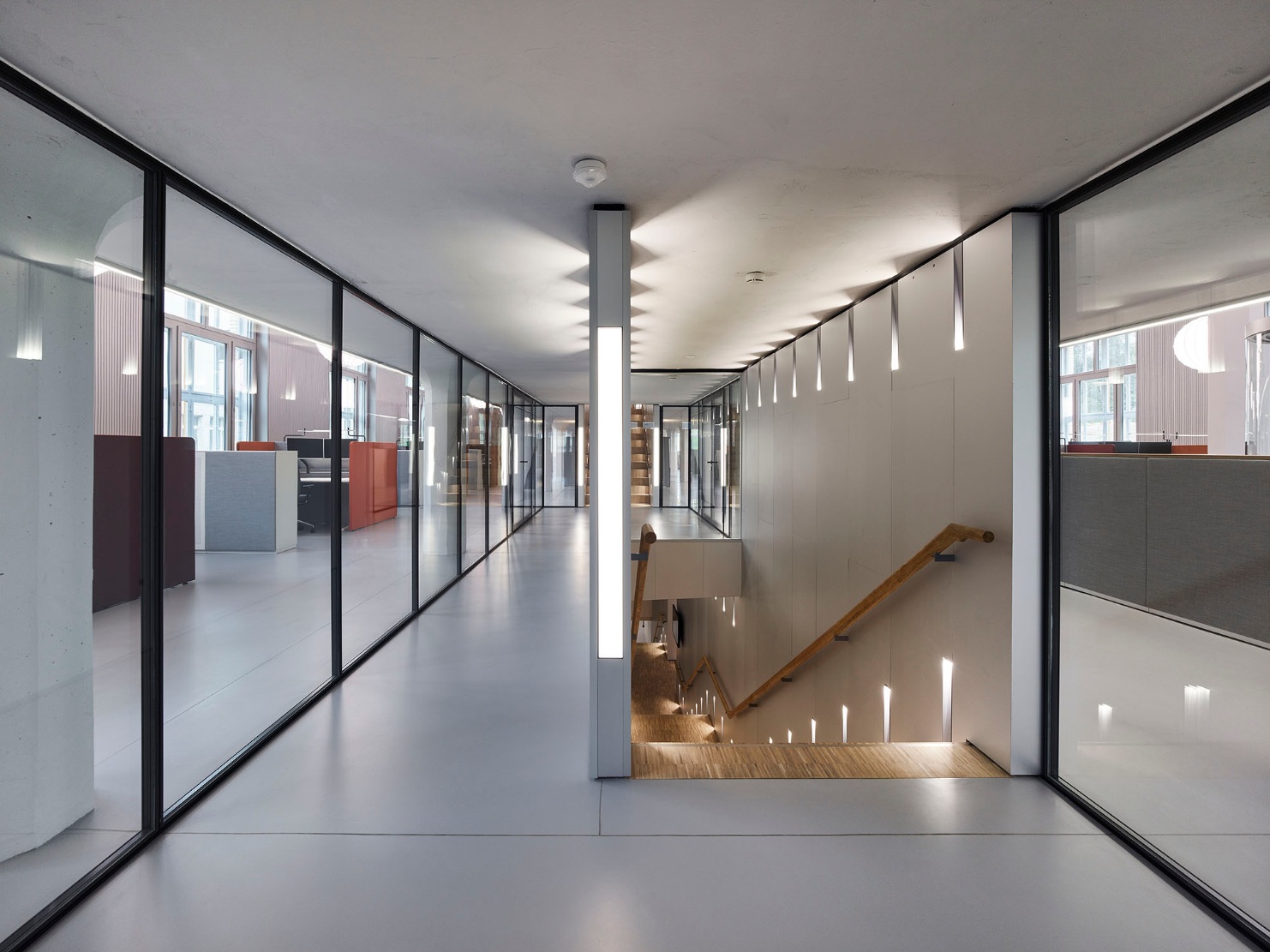 View of the bright hallway with stairs