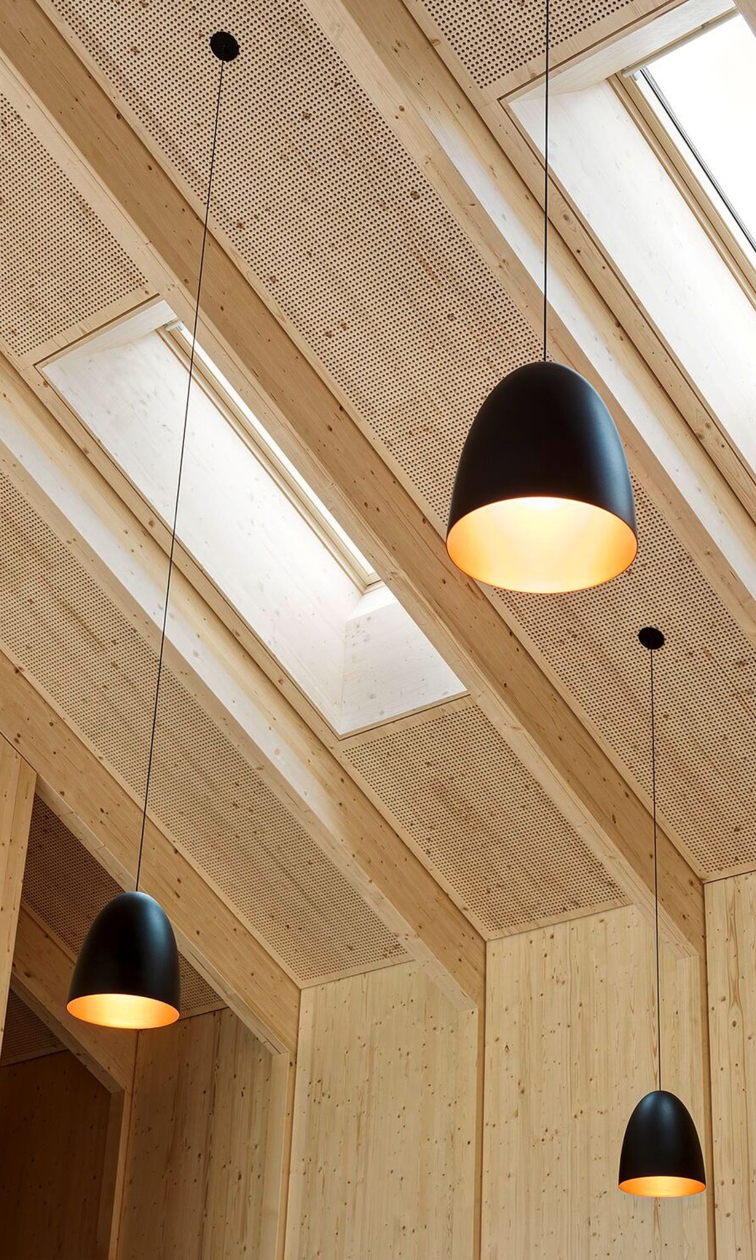 Vue du foyer du bâtiment de séminaires Hof Weissbad dans le couloir et dans une salle de séminaire