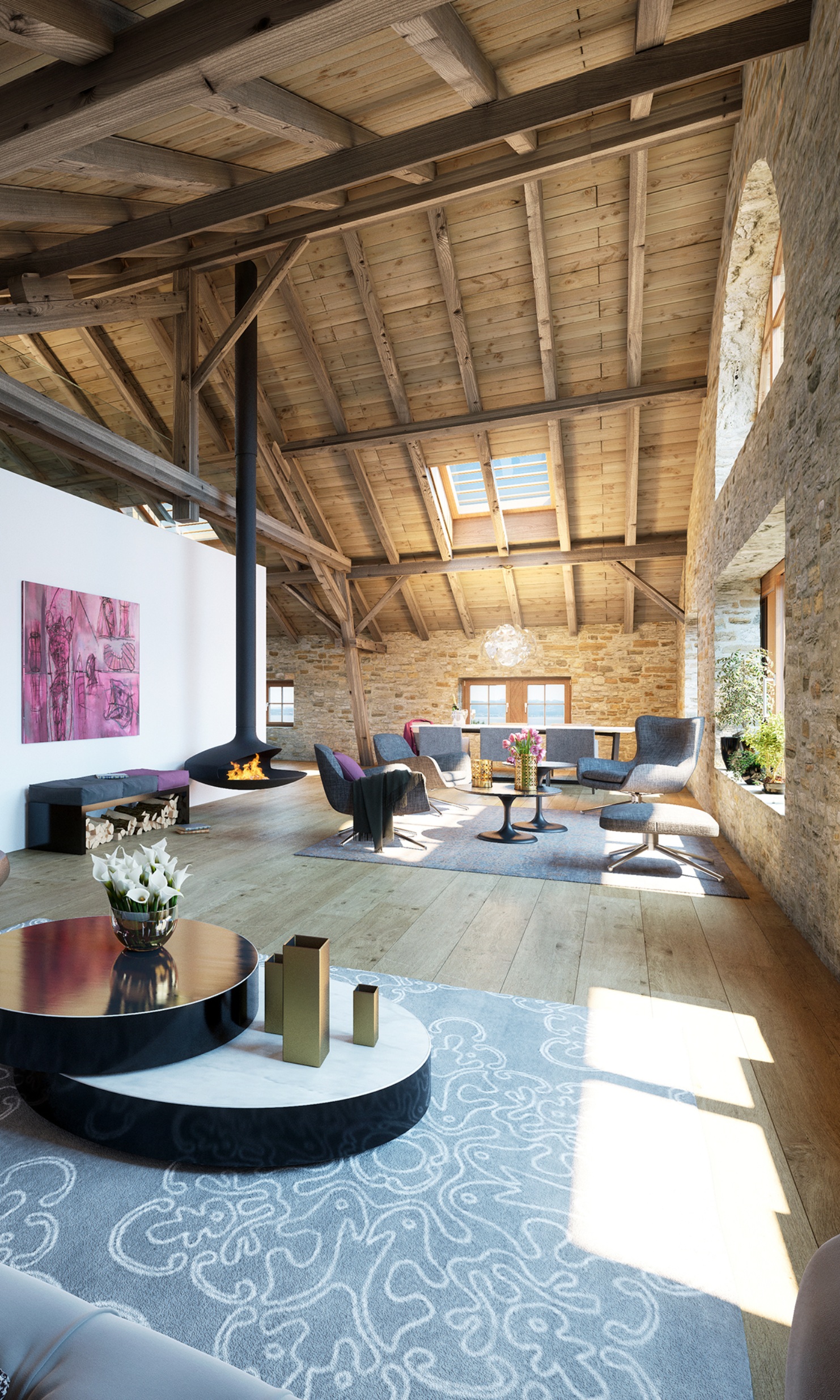 Wohnbereich des Kornhaus Romanshorn ausgestattet mit Kamin, Sitzmöglichkeiten und einer angenehmen Atmosphäre