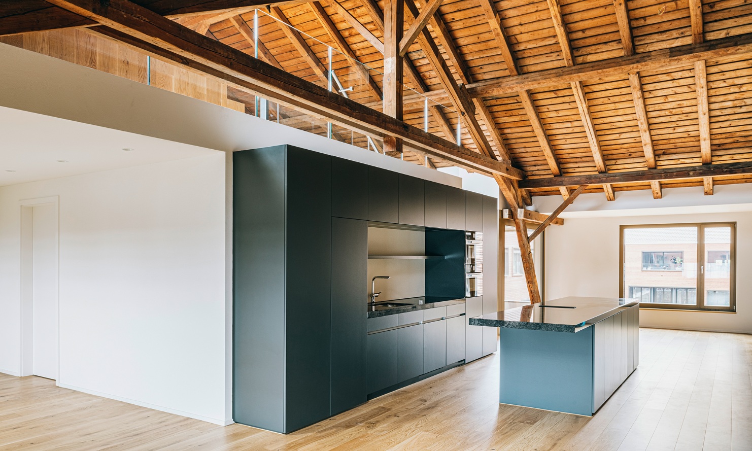 Open-plan kitchen with gallery