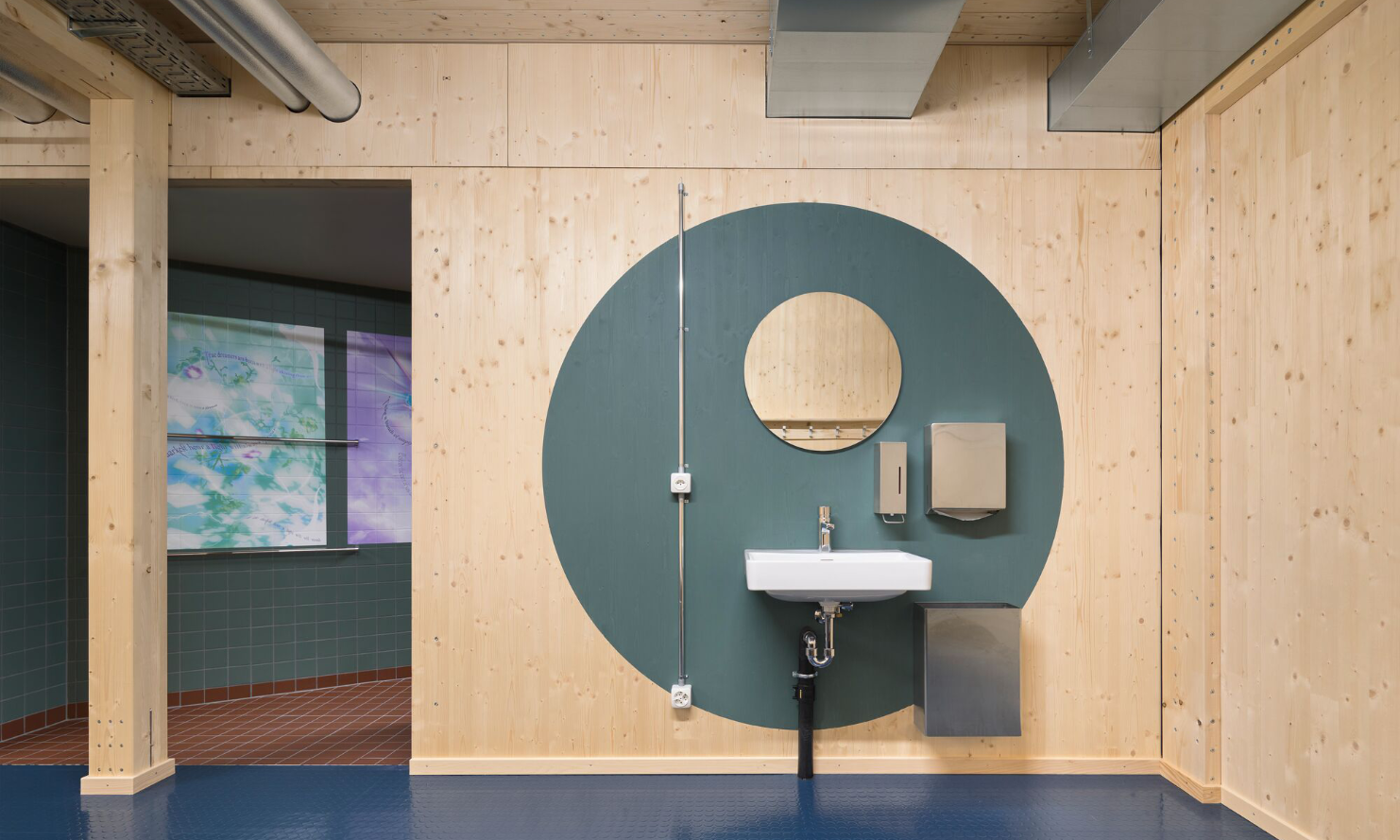 WC/shower/changing room area made of wood of the temporary gymnasium <br/>