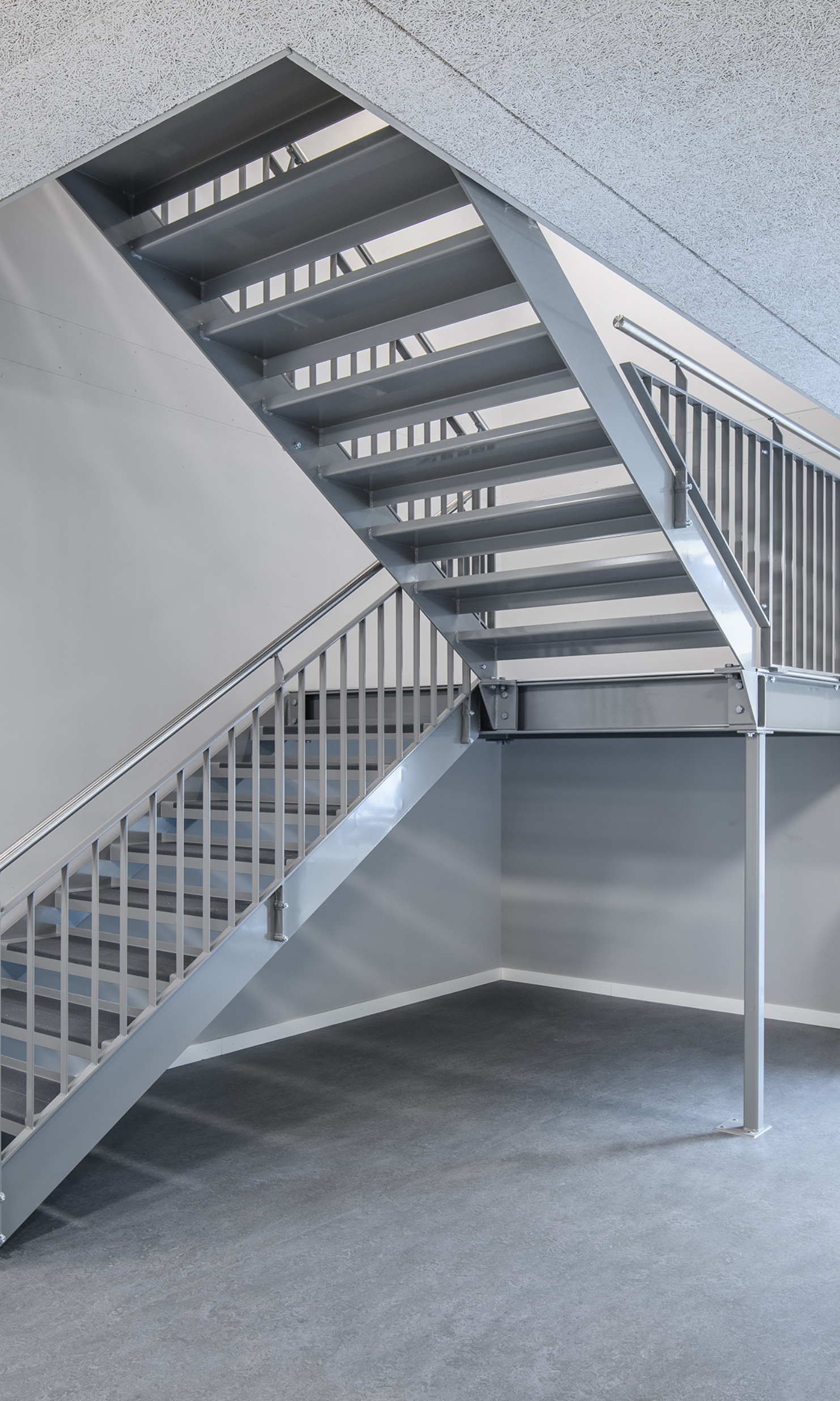 Metal stairway in the temporary St. Karli school building