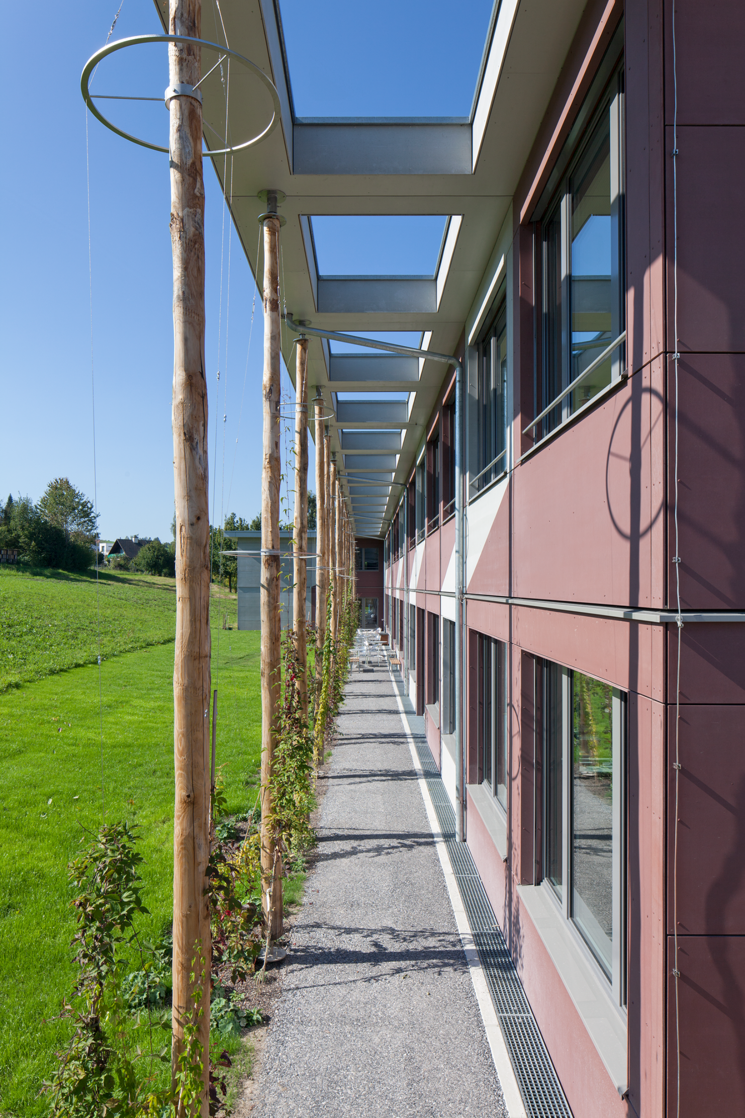 Facade with fixtures for greenery on the building <br/><br/>