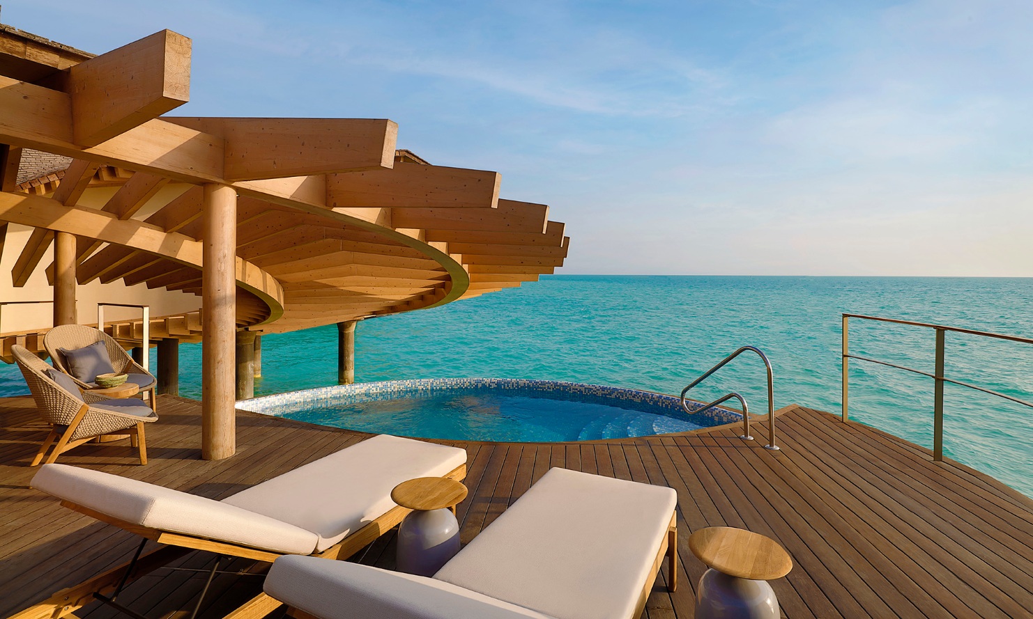 View of the sun terrace of one of the water villas overlooking the Red Sea