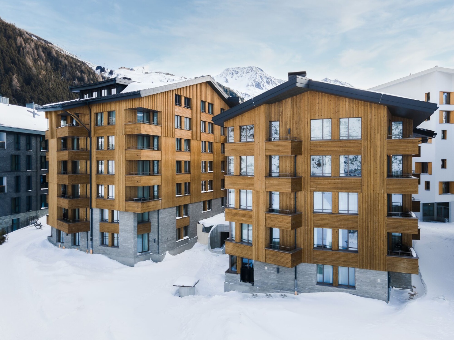 Les deux immeubles d’appartements de Turmfalke avec façade en bois