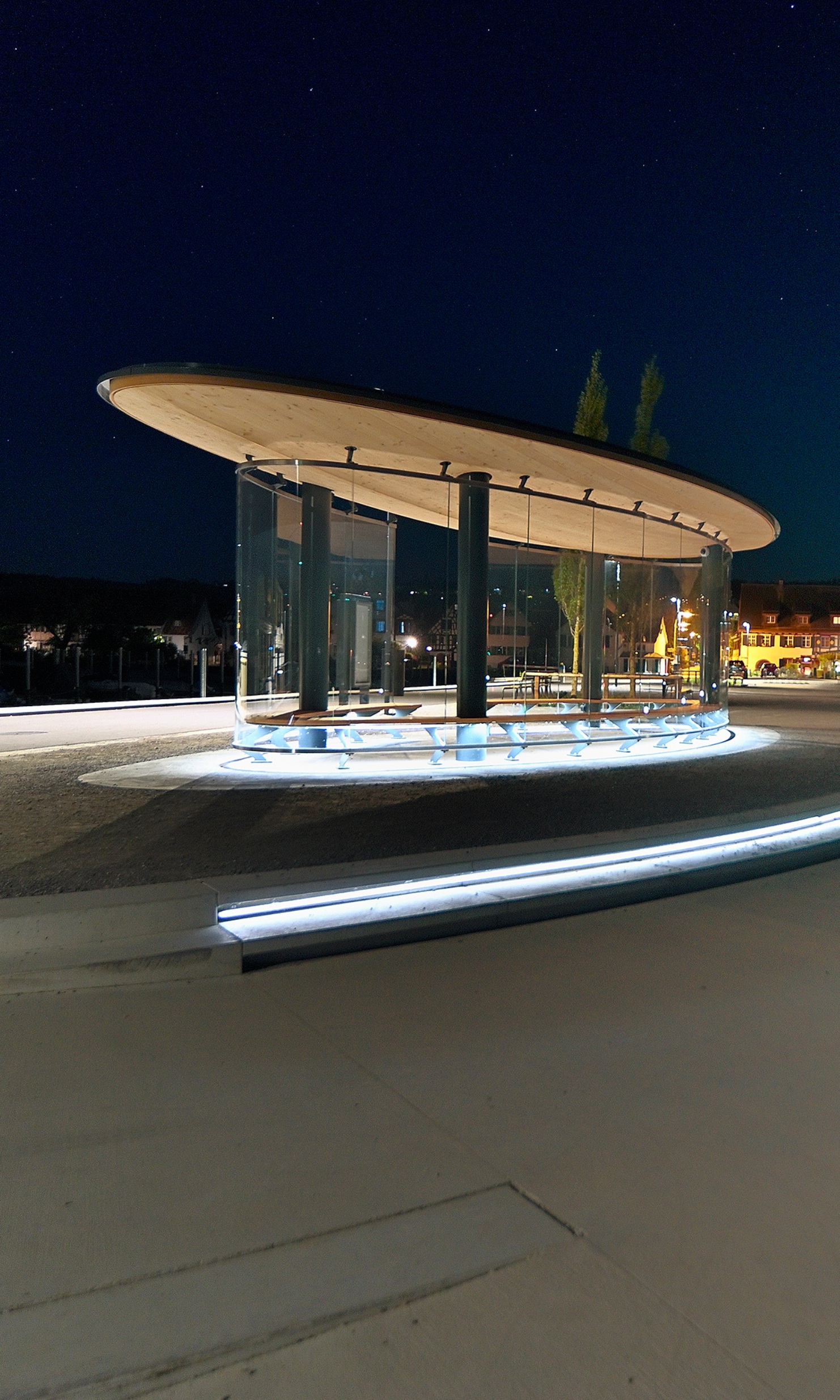 Brightly lit Stedi shelter on the Ermatingen wharf