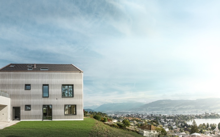 The overall view of the timber construction shows the aesthetic yet understated design of the building.