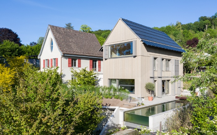 Full view with large garden: 1930s house and new building extension with pool