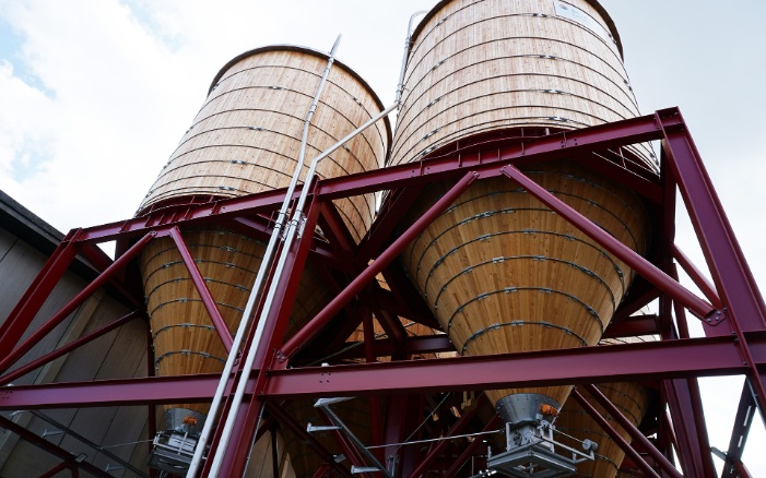 Wooden grit silo facility with six round silos of 200m3 each in Frauenfeld