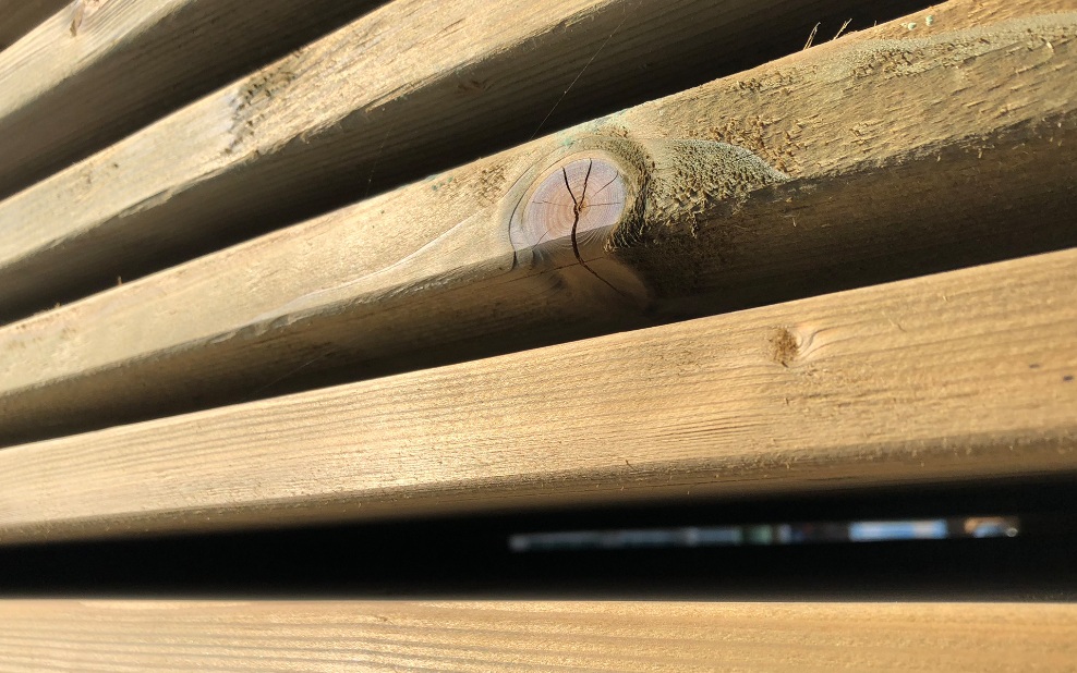 Close-up of pressure-treated slats