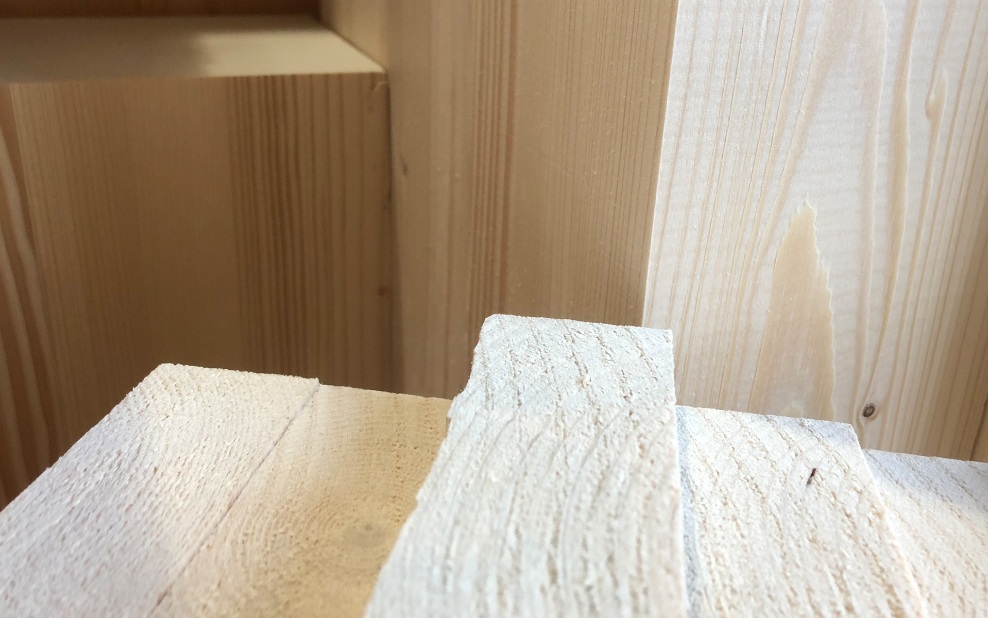 Close-up of different types of glued laminated timber
