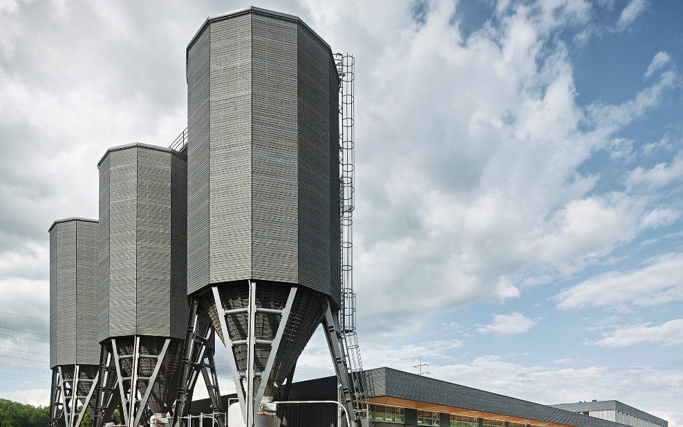 The vast Bern-Wankdorf maintenance depot with its three grey timber silos, viewed from above