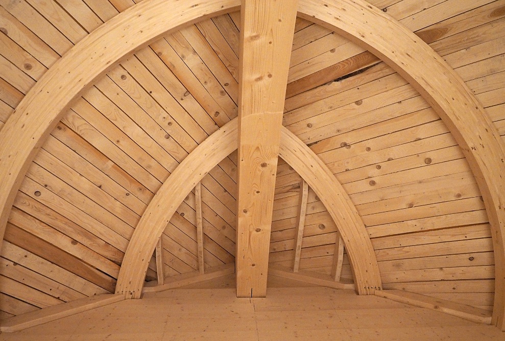 Looking into the waiting room, which boasts a striking timber design.