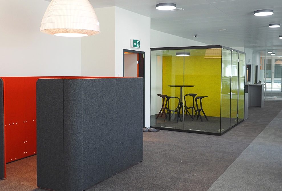 Internal view of the Fust extension with enclosed meeting booths 