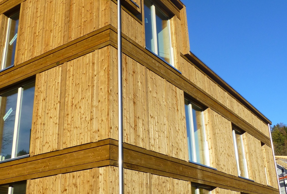 View of the Mattenbach apartment building from a side perspective against a blue sky