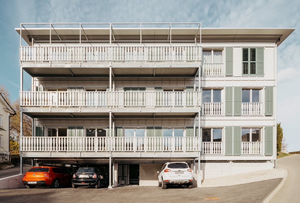 The modular timber construction in the centre of Herisau with nine microapartments