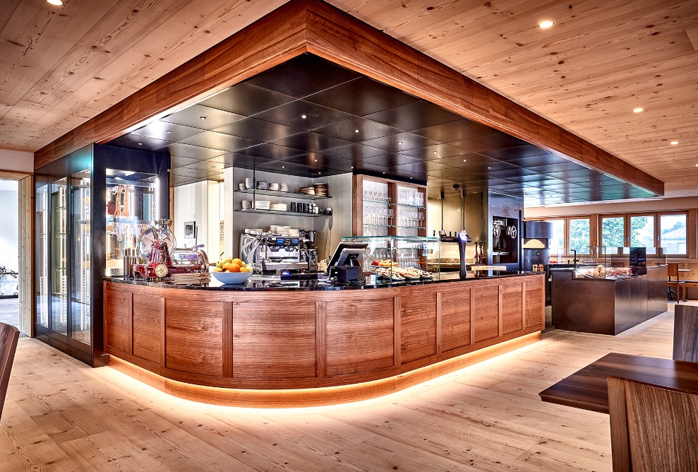 Interior finishing of the Hotel-Restaurant Dorfhus Gupf entirely in dark wood