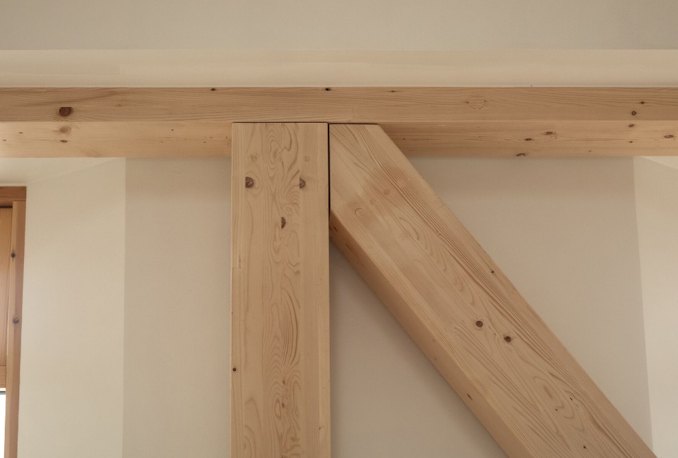 View of the wooden beam structure in the MiniCO2 house
