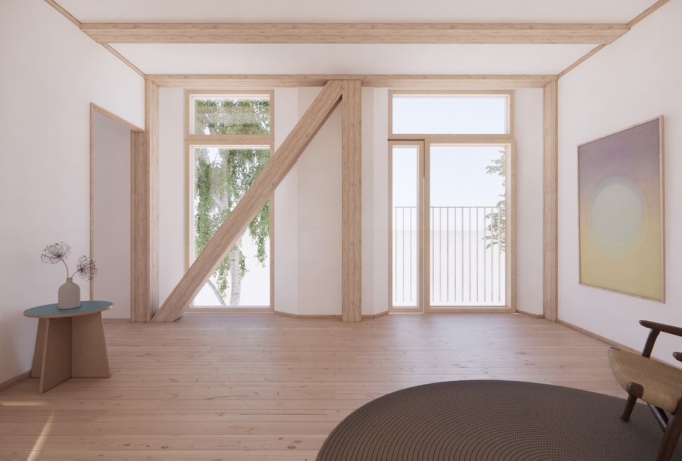Blick in das hellbeleuchtete Wohnzimmer einer Wohnung im MiniCO2 Haus.