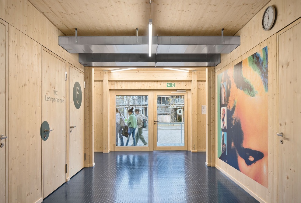 Students in the entrance area of the temporary sports hall.