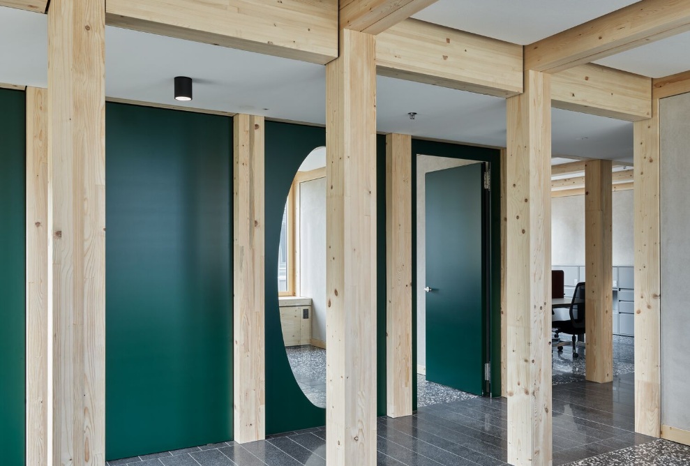 Interior with Timber Columns and Clear Spatial Sequence in the Government Building Frauenfeld