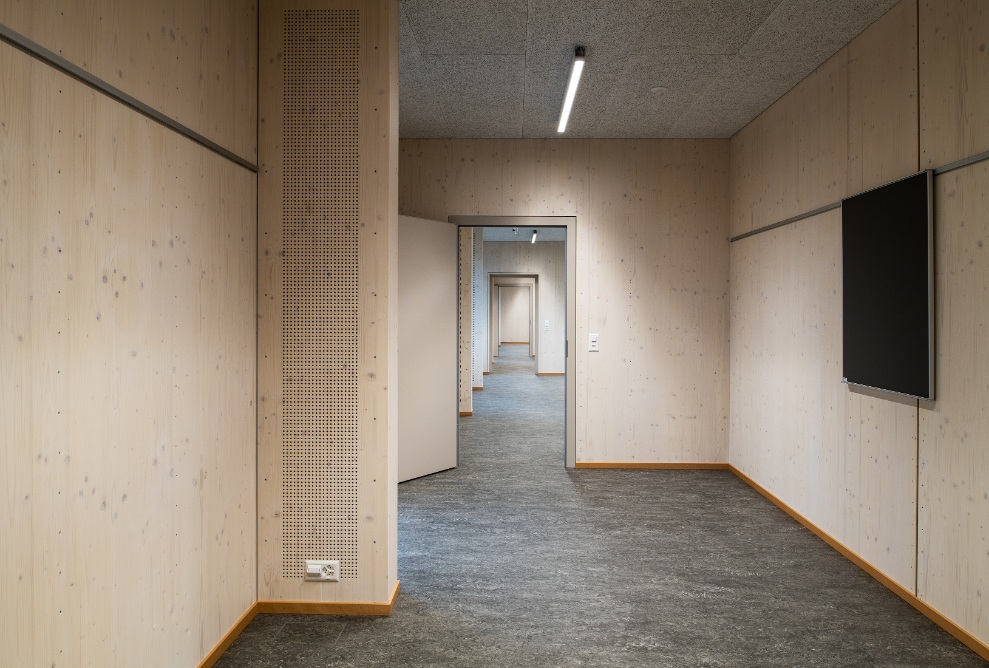 Corridor with timber walls in the temporary Falletsche school building