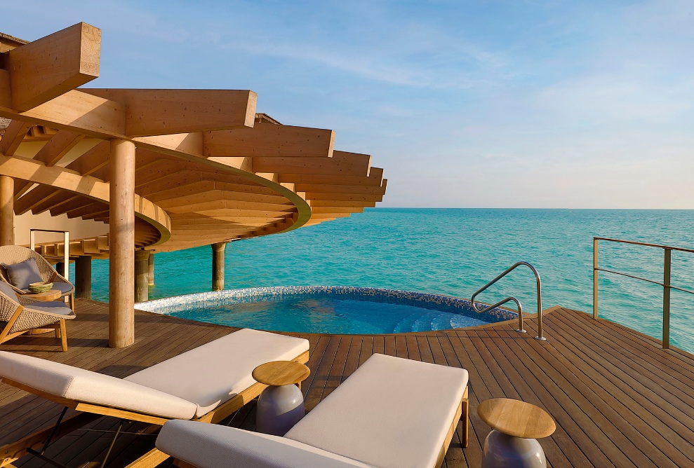 View of the sun terrace of one of the water villas overlooking the Red Sea