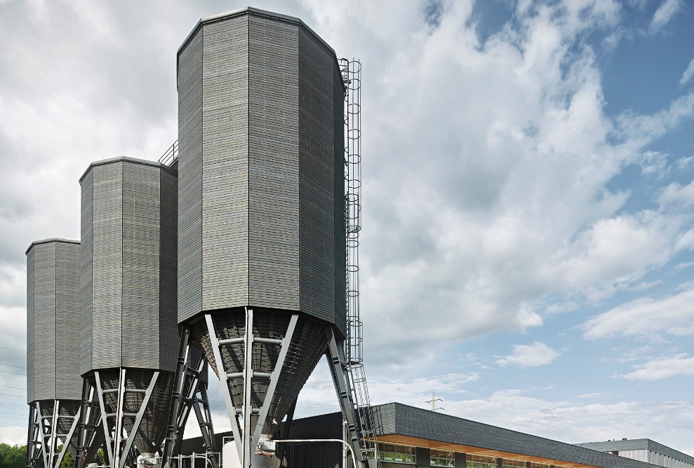 The vast Bern-Wankdorf maintenance depot with its three grey timber silos, viewed from above